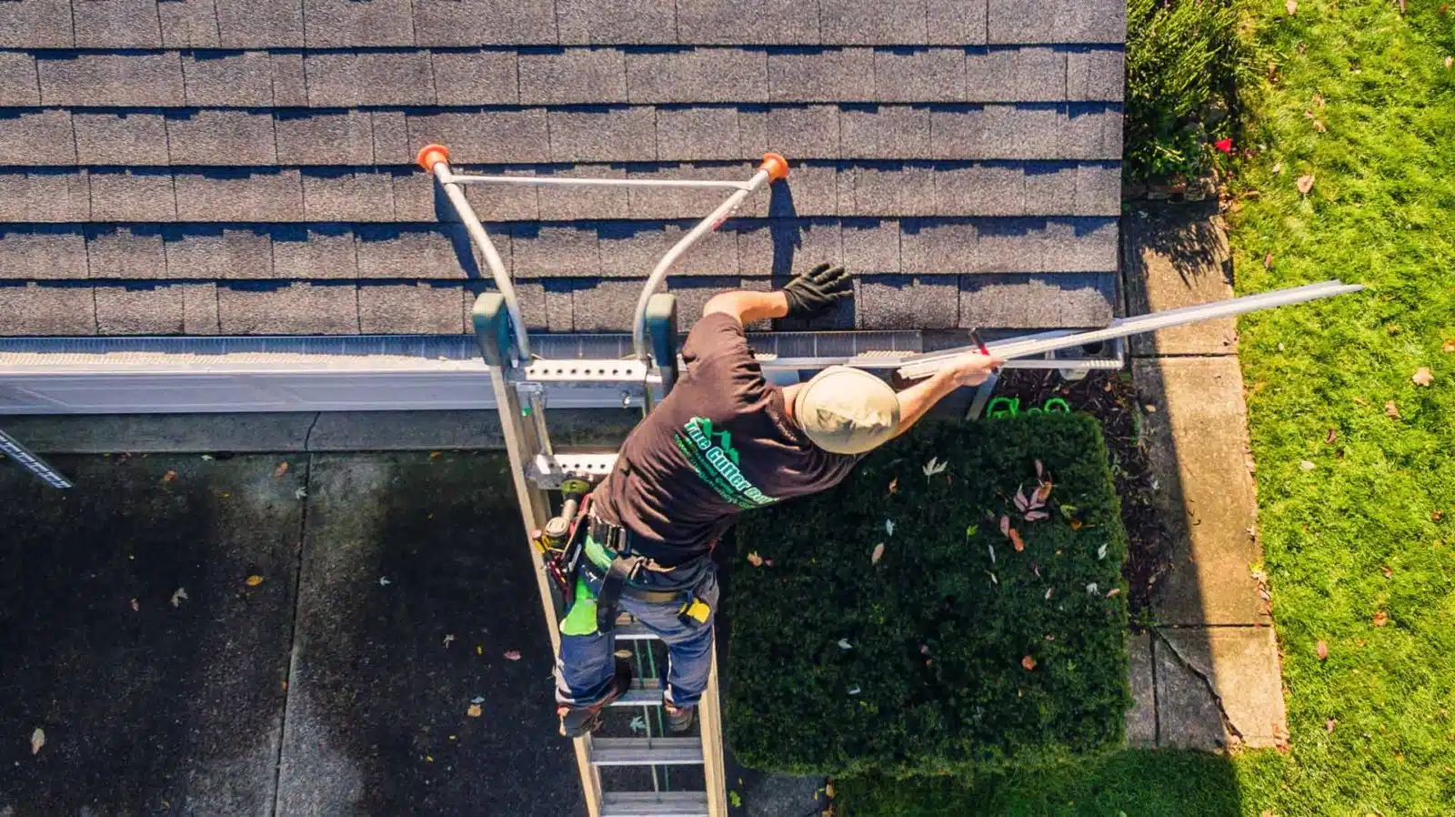 aerial view of gutter technician installing new gutters